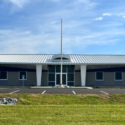 The west side of the airport terminal serves as the main entrance to building and features the domed skylight.