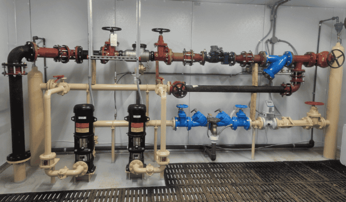 Booster station piping at Pleasant Hill Lake Park supporting adequate water pressure for the force main installed beneath Pleasant Hill Lake