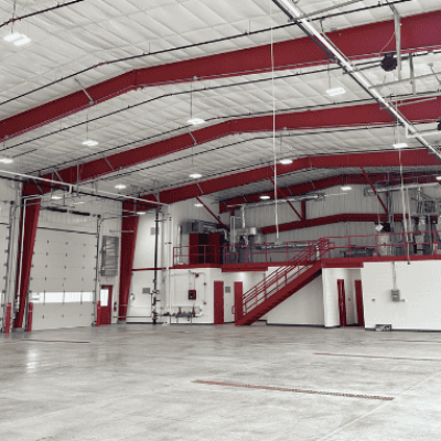 An interior view of the Plymouth Fire Station provides a look at the 1,000 SF mezzanine, used for mechanical equipment, storage, and fire and rescue training.