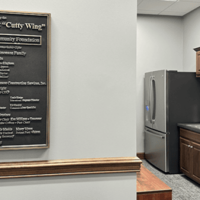 A bronze plaque is affixed to the wall of the new Cutty Wing at the Ashland County Community Foundation, acknowledging all of the donors who contributed to the project.