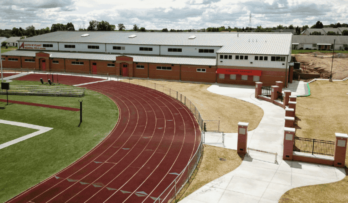The fieldhouse at Ashland City Schools is situated just south of the 8-lane track at the high school football stadium. A concrete walkway connects the fieldhouse to the stadium entrance.