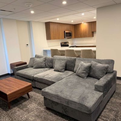 Seniors in Ashland University Amstutz Hall have an open concept area where a couch and kitchen are both available in the space.