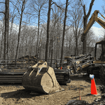 Force main waterline installed under Pleasant Hill Lake connected at Mohican State Lodge by Simonson Construction.
